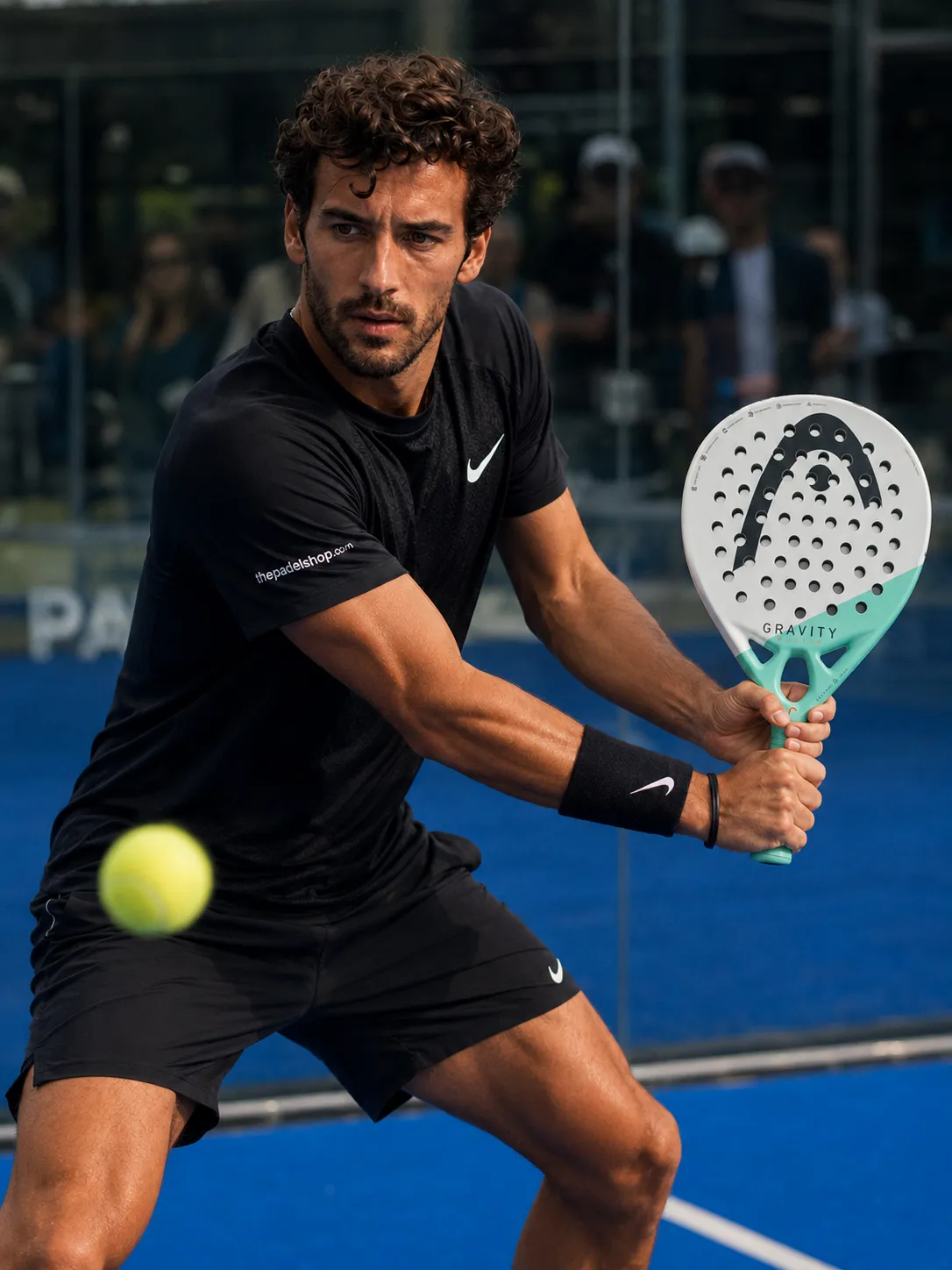 Luca Navarro testing the Head Gravity Motion 2024 padel racket on court