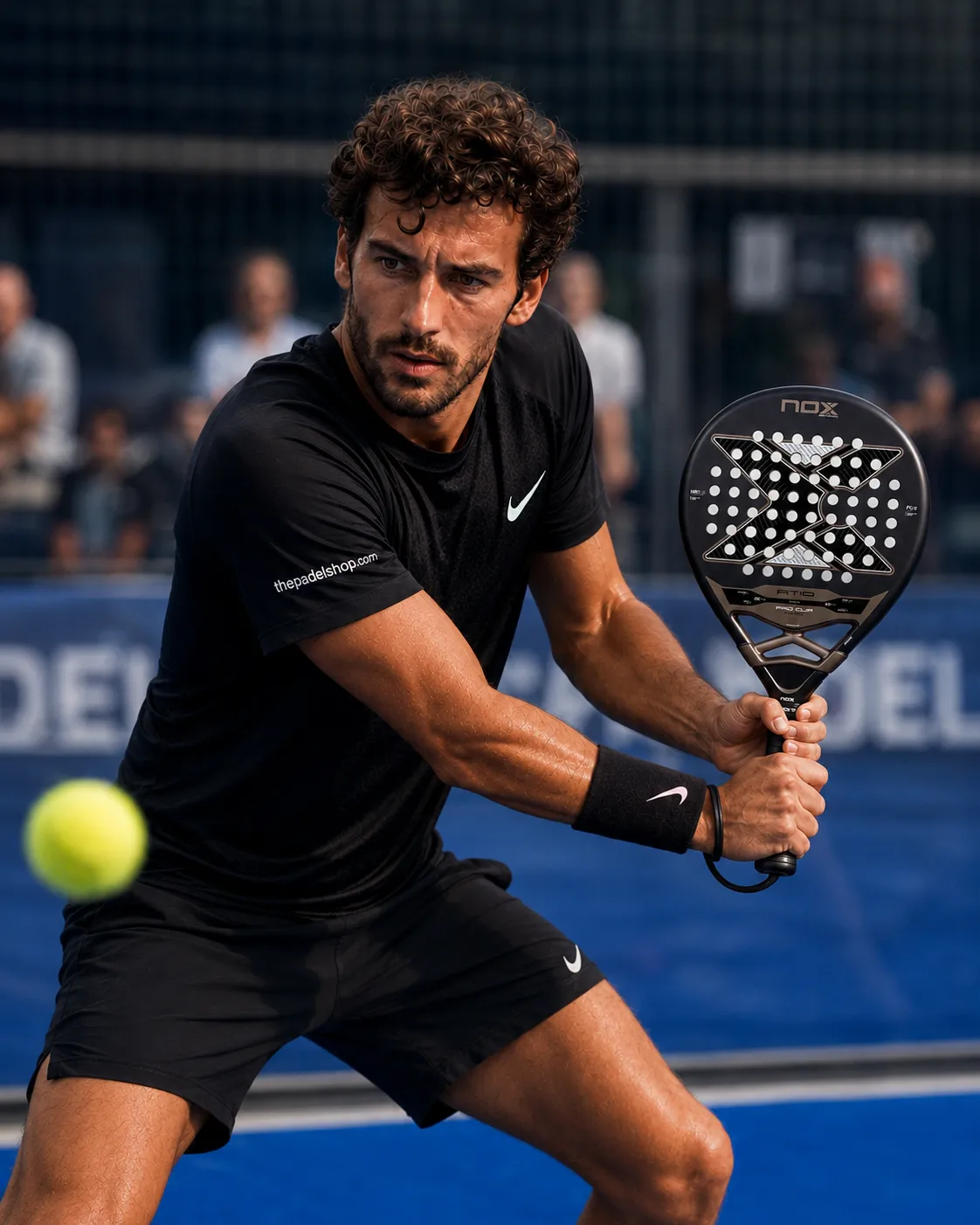 Luca Navarro testing the Nox AT10 Pro Cup Hard padel racket on court