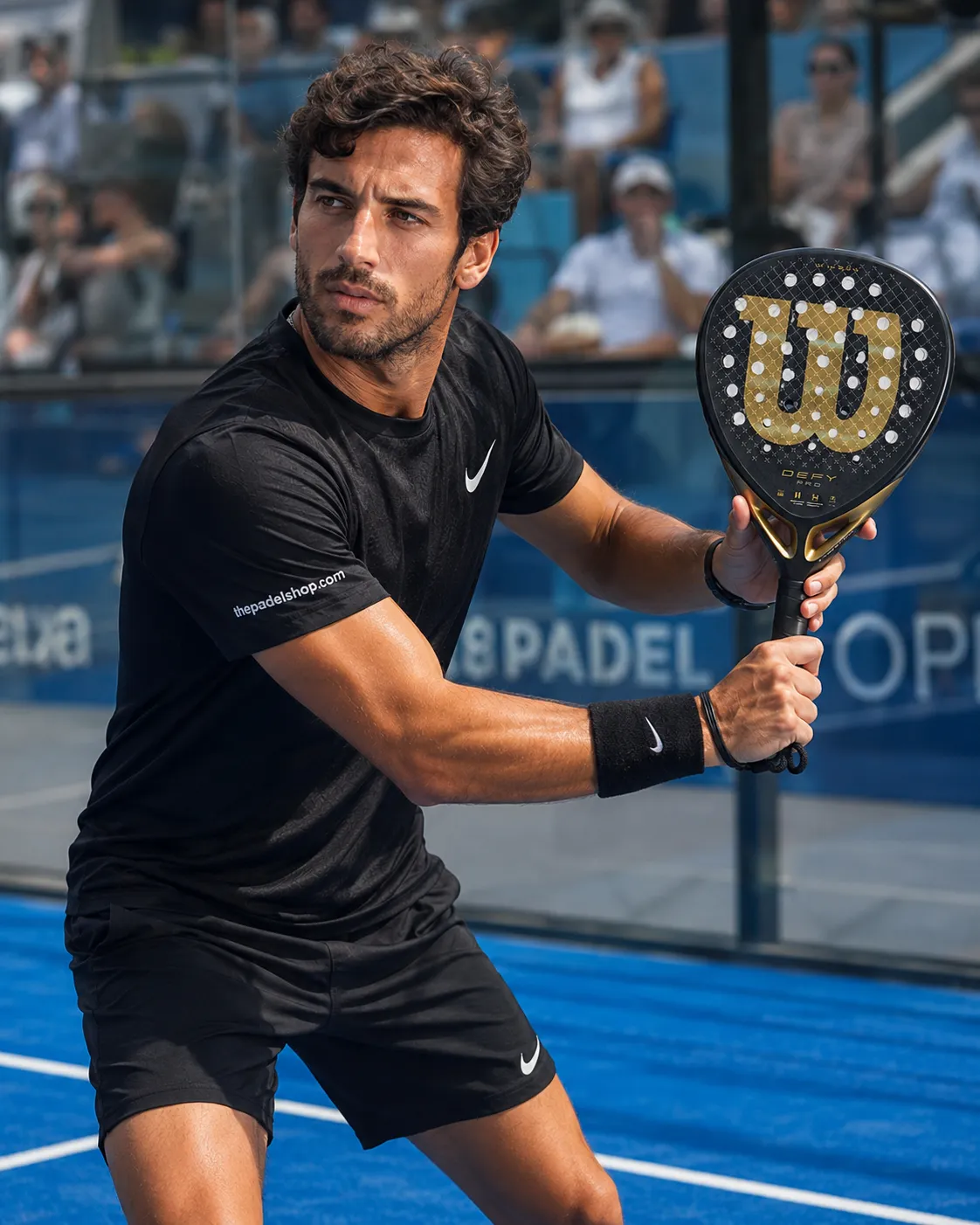 Luca Navarro testing the Wilson Defy Pro V1 padel racket on court